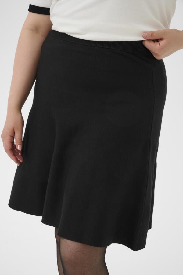 Closeup biew of Kaffe Curve Melina Skirt in Black on a white background.