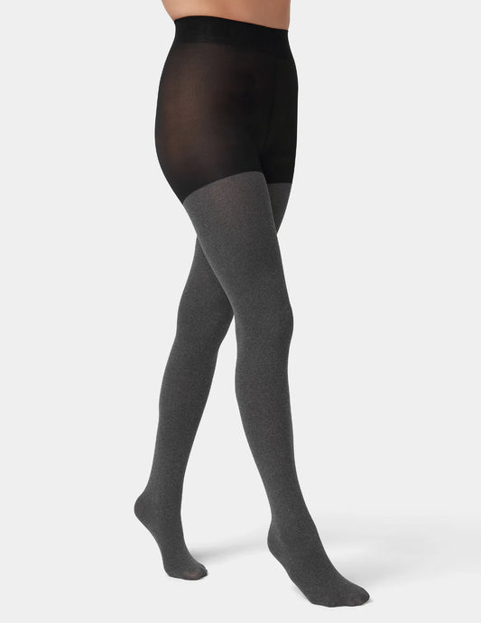 Person wearing HUE super opaque control top tights 90 denier heavy opaque finish